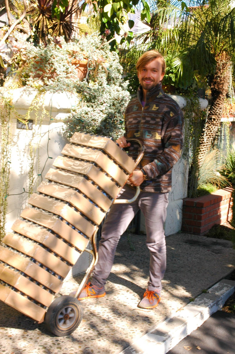 Scott loading a delivery, 2014